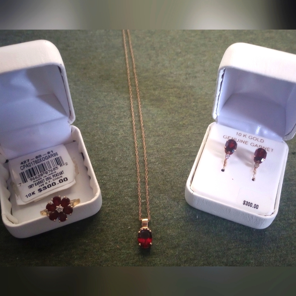 14k Gold Chain, 10k Gold Genuine Garnet Pendant and Earrings and Size 7 ring.